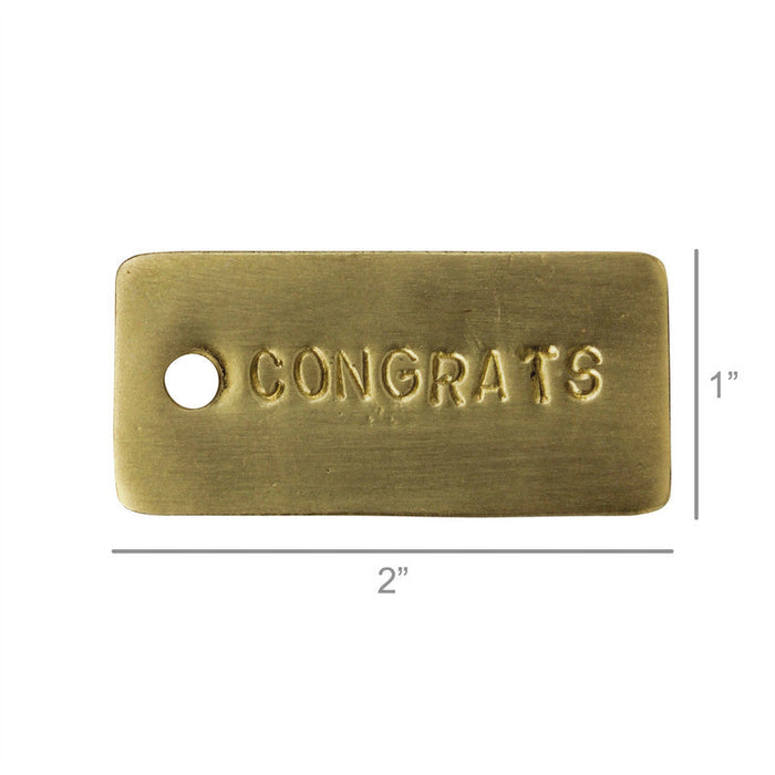 Brass gift tag reading CONGRATS, 2in x 1in rectangle with hole