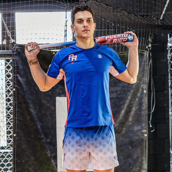 Adult model wearing blue Diamond Tech Vented Puerto Rico graphic tee
