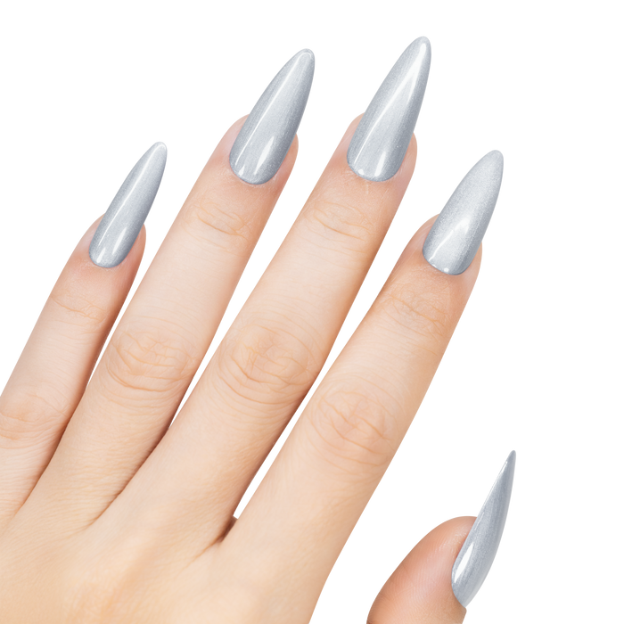 Hand with silver stiletto nails on a white background