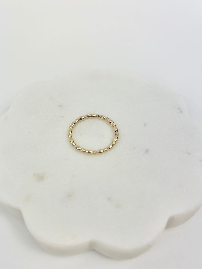 eNewton Gold Harmony Ring Rings in at Wrapsody