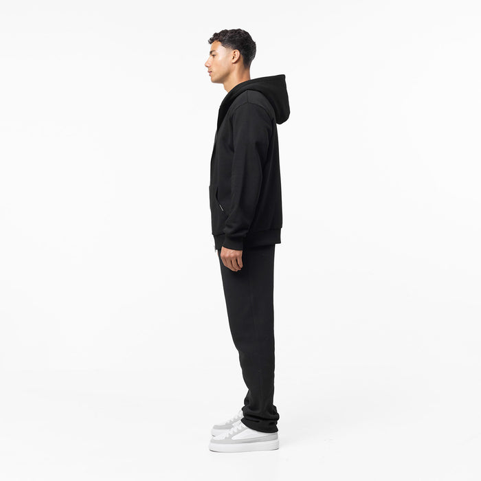 Full side view of full black tracksuit