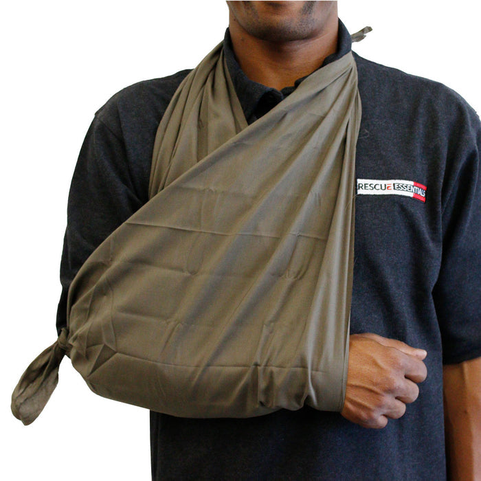 Rescue Essentials Triangle Bandage in use as sling