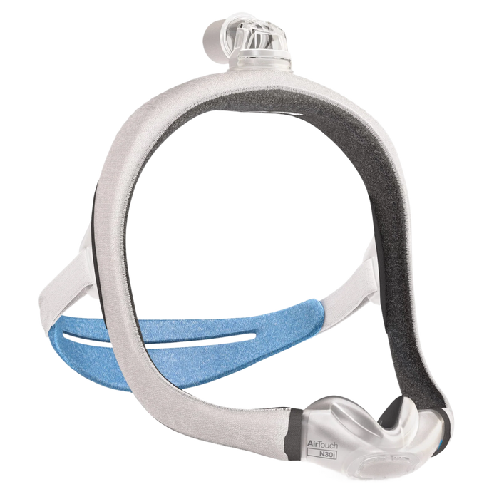 ResMed AirTouch N30i nasal CPAP mask with a top-of-head tube connection, soft memory foam cushion, and fabric-wrapped headgear with blue accents.
