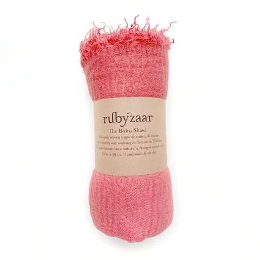 Salmon-pink boho shawl with fringes, rolled fabric bundle showing rubyzaar label