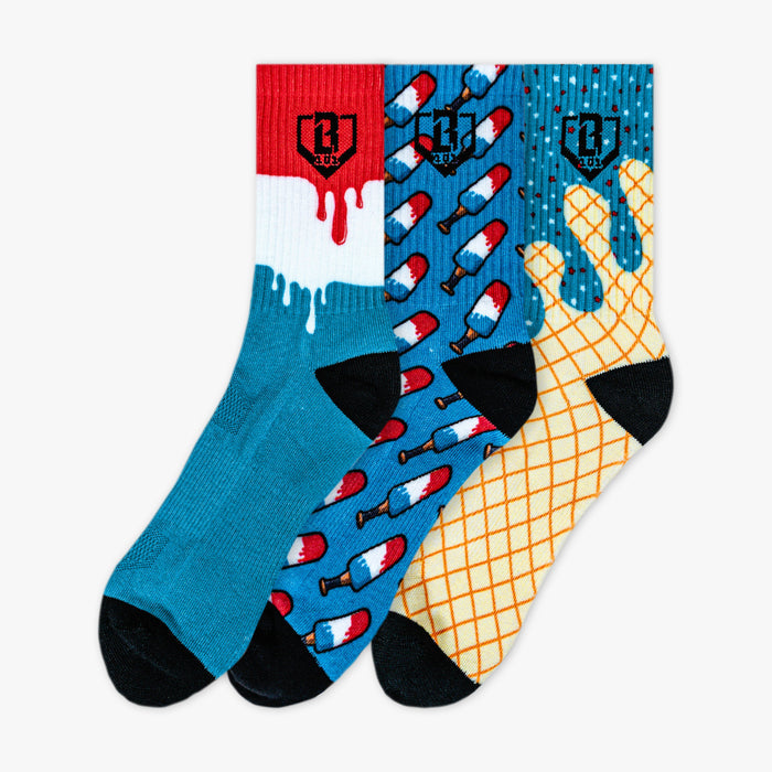 Adult model wearing red, white & blue socks with "Freeze Pop Performance  3-Pack" design