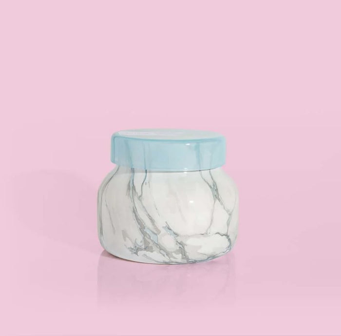 Capri Blue Modern Marble 19oz Candle Candles in Blue Jean at Wrapsody