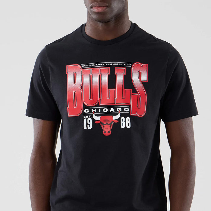 The model is wearing this NBA Arch Graphic Chicago Bulls T-Shirt in black. 3