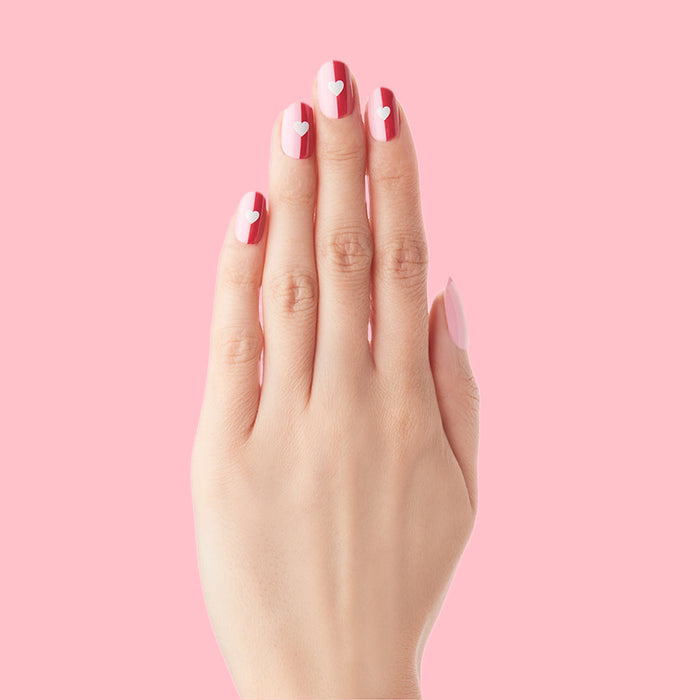 Colorblock Heart - Press-On | Short | Round hand with short round false nails featuring pink color blocks and white heart details