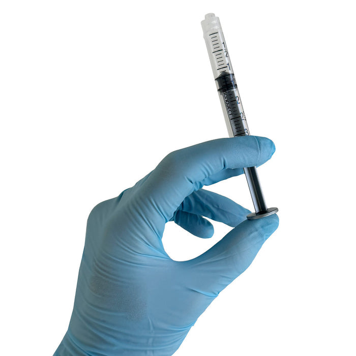 Syringe in hand