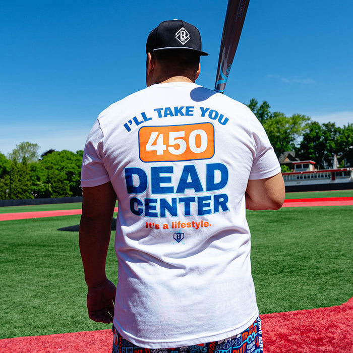 Adult model wearing white graphic tee with "Dead Center" design