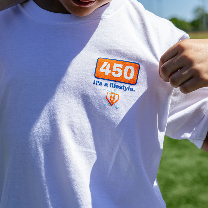 Youth model wearing white youth graphic tee with "Dead Center Youth" design