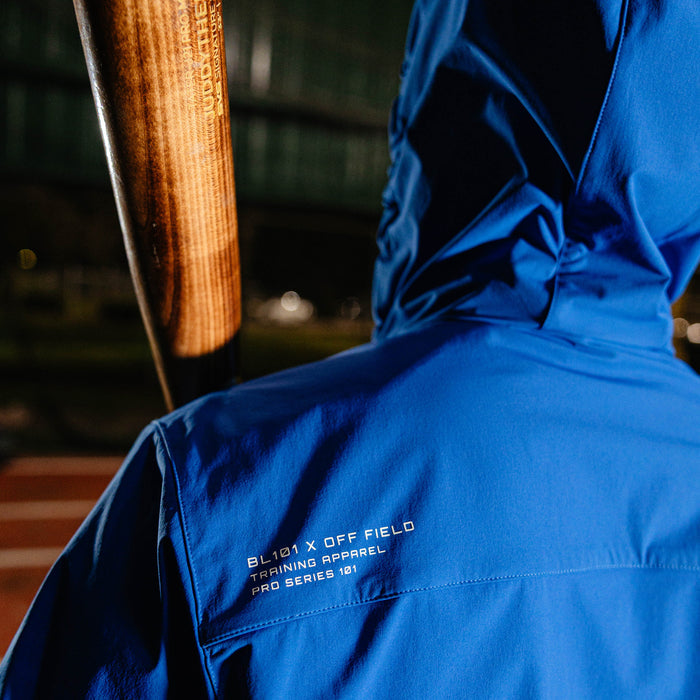 Adult model wearing blue Diamond Tech Pro Cage Jacket Royal Blue jacket
