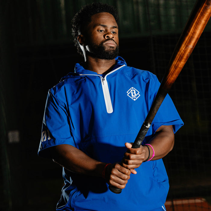 Adult model wearing blue Diamond Tech Pro Cage Jacket Royal Blue jacket