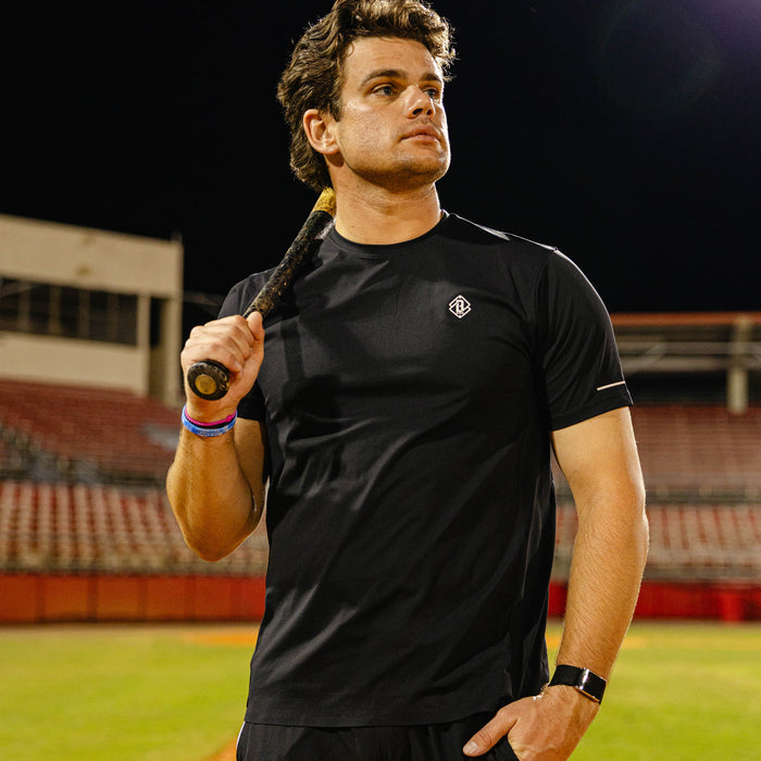Adult model wearing black Diamond Tech Vented graphic tee