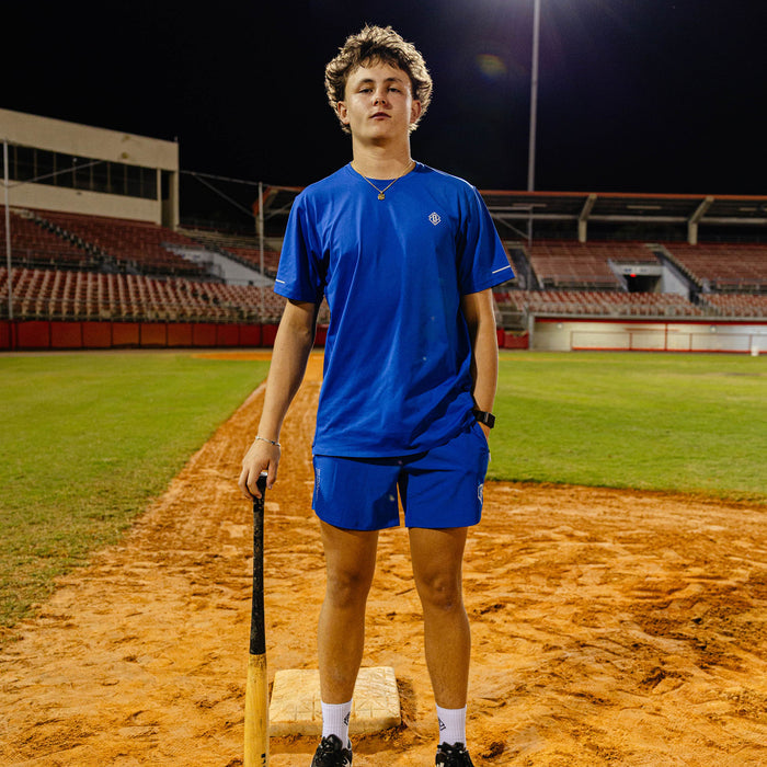 Adult model wearing blue Diamond Tech Vented Royal Blue graphic tee