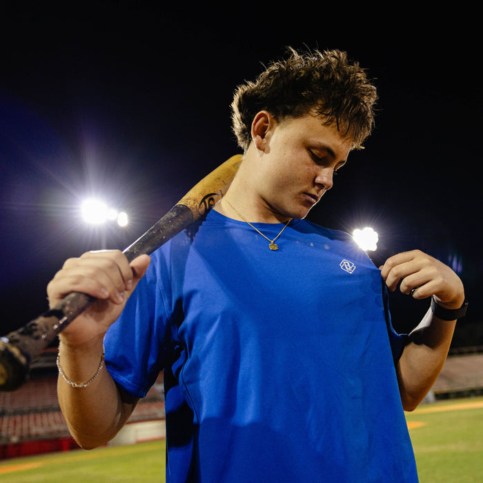 Adult model wearing blue Diamond Tech Vented Royal Blue graphic tee