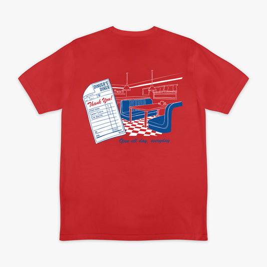 Red t-shirt with a graphic design on the back featuring a restaurant scene and checkered floor.