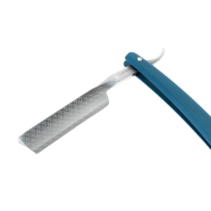 Close-up of Dovo straight razor blade with engraved logo