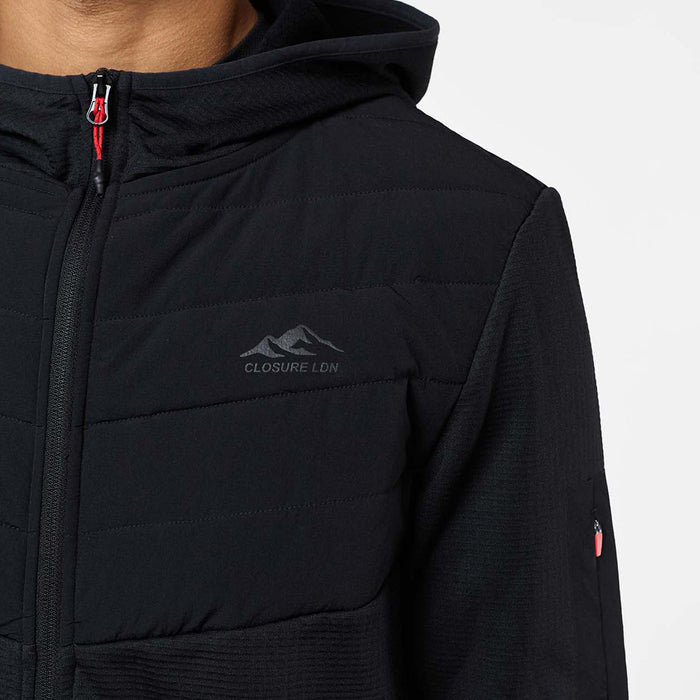 Close-up of black Grid Fleece Hybrid Tracksuit hoodie with quilted chest panel, Closure LDN logo and red zip puller