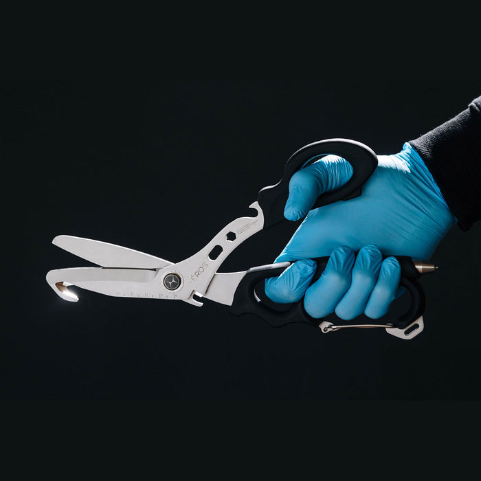 Heros shears, black, on black background in hand