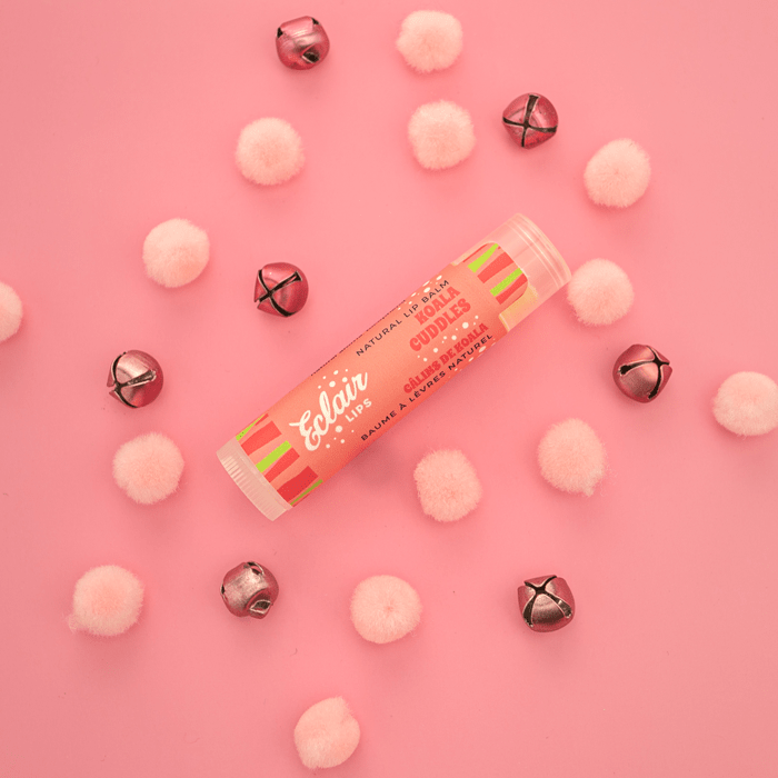 Eclair & Lips Vanilla Cuddles lip balm with pom-poms, bells