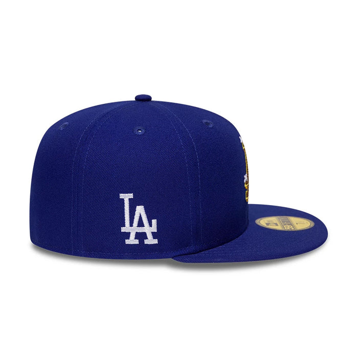 Pictured is this MLB Emblem LA Dodgers 59FIFTY Fitted cap in dark blue. 5