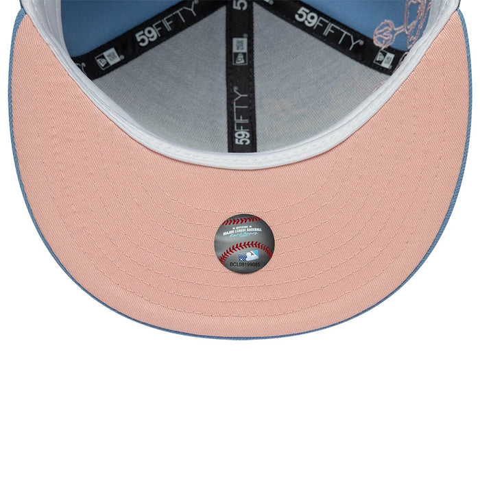 Pictured is this MLB Floral Outline LA Dodgers 59FIFTY Fitted cap in pastel blue. 2