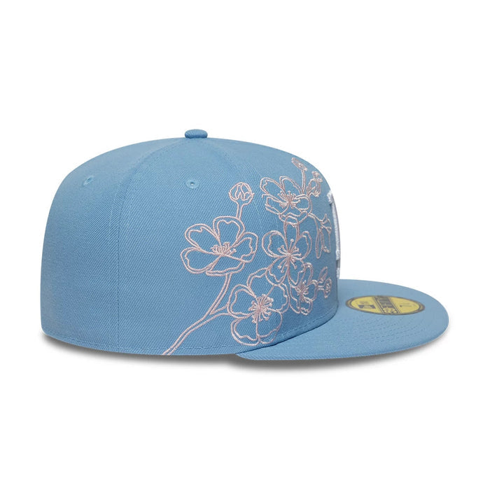 Pictured is this MLB Floral Outline LA Dodgers 59FIFTY Fitted cap in pastel blue. 5