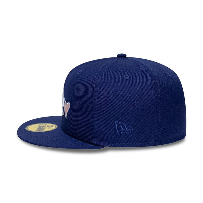 Pictured is this MLB Heart LA Dodgers 59FIFTY Fitted cap in dark blue. 7