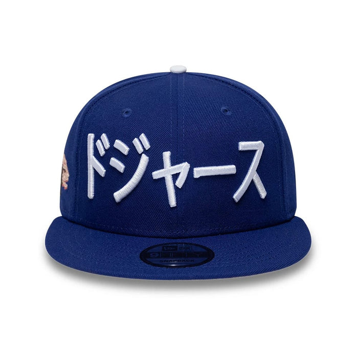 Pictured is this MLB Kanji LA Dodgers 9FIFTY Snapback Adjustable cap in dark blue. 3