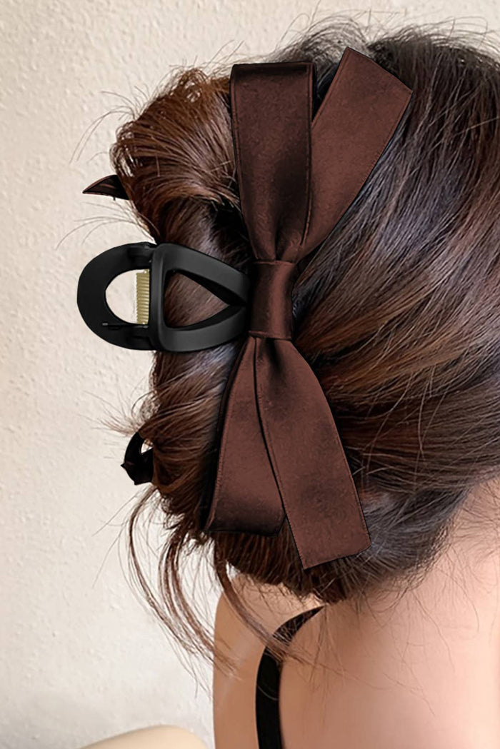 Large LDC Bow Decor Hair Claw Clip by Little Daisy Closet, featuring a decorative bow design in a close-up view.