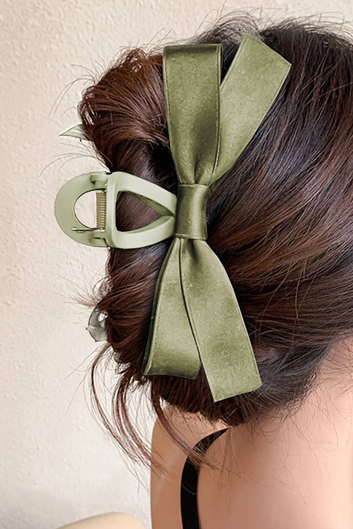 Large LDC Bow Decor Hair Claw Clip by Little Daisy Closet showcasing a stylish hair accessory with bow embellishment.