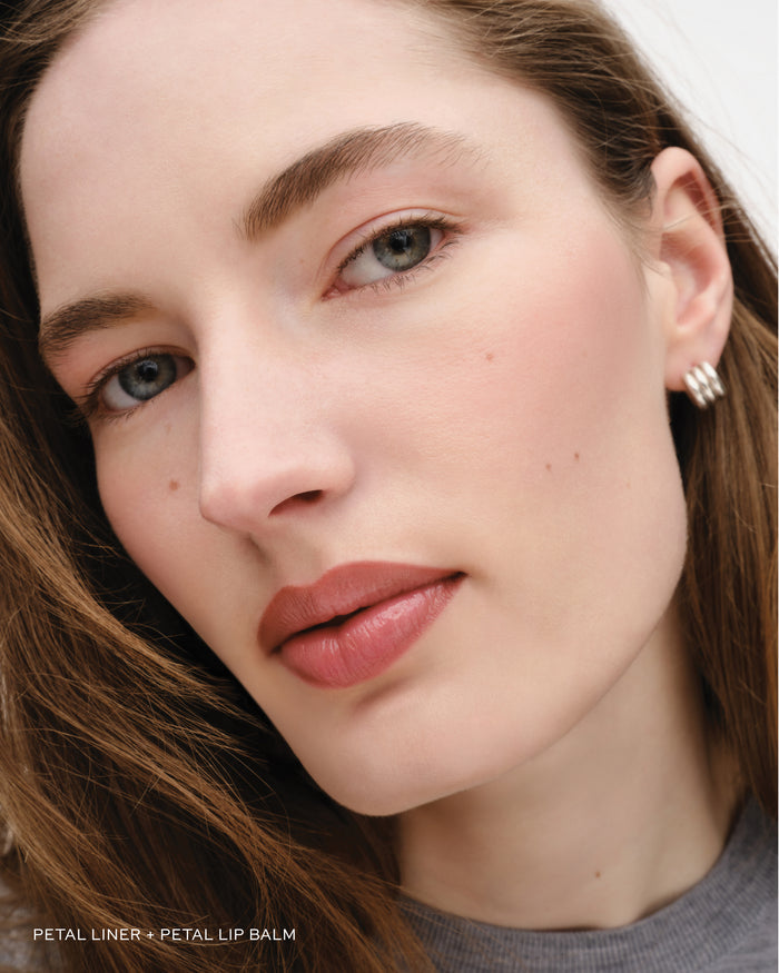 Model wears lip liner in Petal.