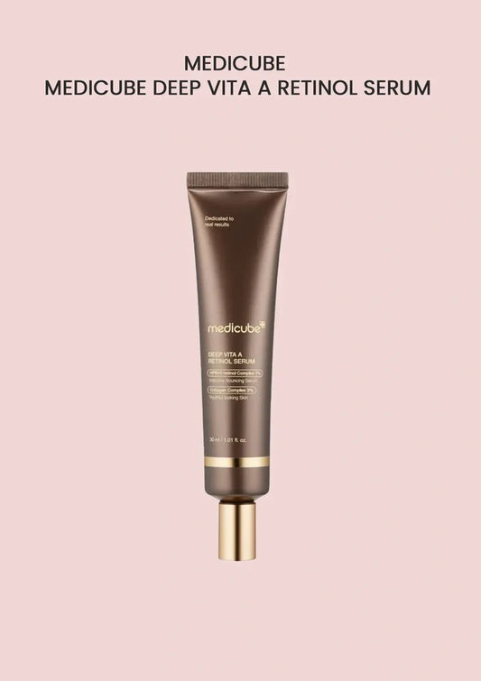 Medicube Deep Vita A Retinol Serum on a pink background