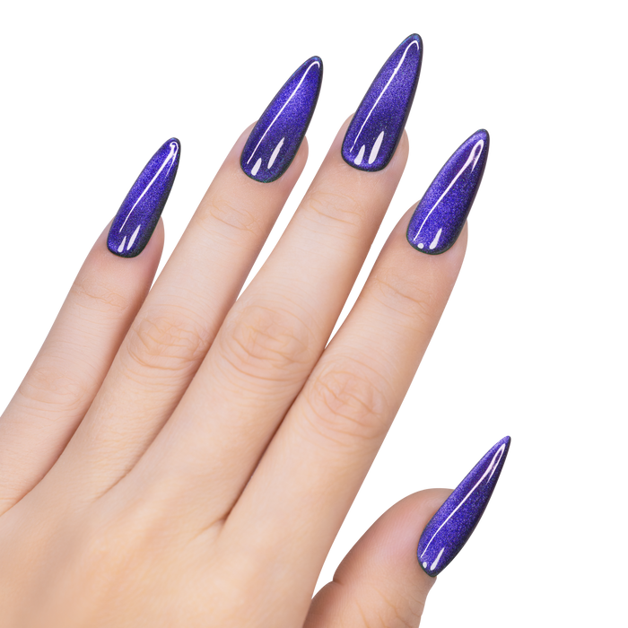 Hand with purple glittery nail polish on a white background
