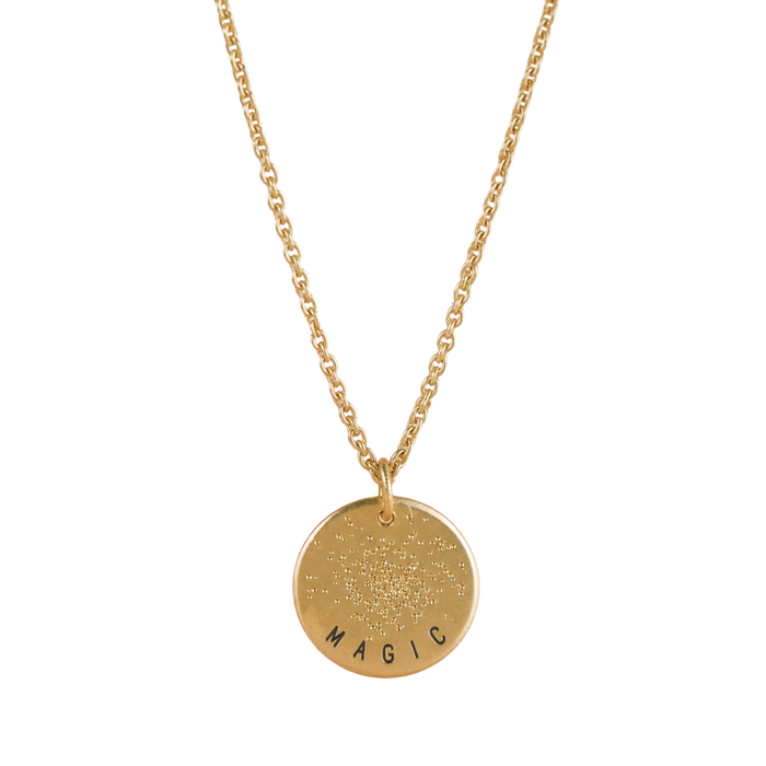 Gold plated mini coin necklace with diamond-dusted round pendant and "MAGIC" engraving
