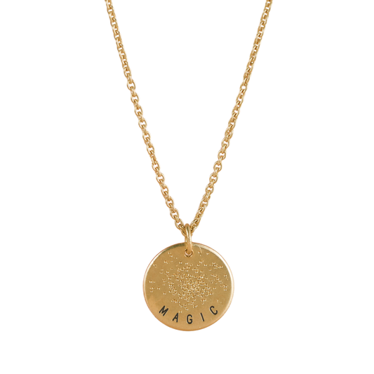 Gold plated mini coin necklace with diamond-dusted round pendant and "MAGIC" engraving