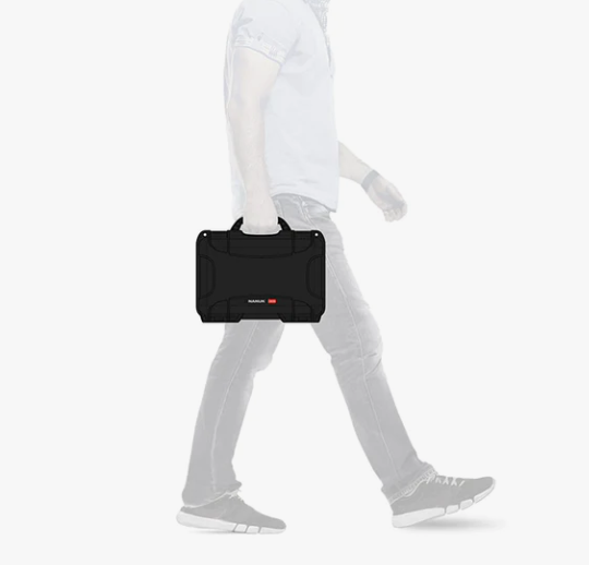 Nanuk 909 Case- Black, being carried