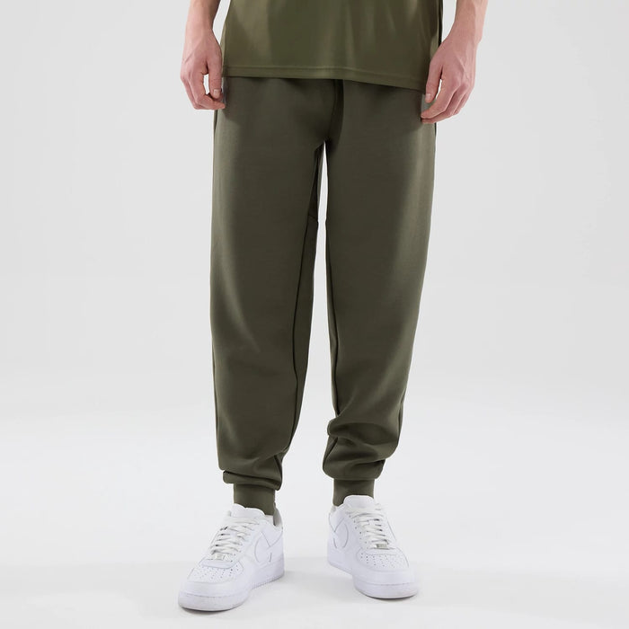 The model is wearing these MLB Core Plus New York Yankees Joggers in green. 1