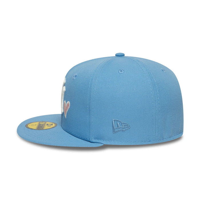 Pictured is this MLB Heart New York Yankees 59FIFTY Fitted cap in pastel blue. 6
