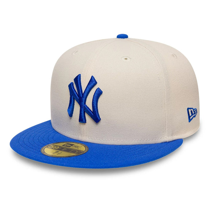 Pictured is this MLB League Essential New York Yankees 59FIFTY Fitted cap in blue. 1