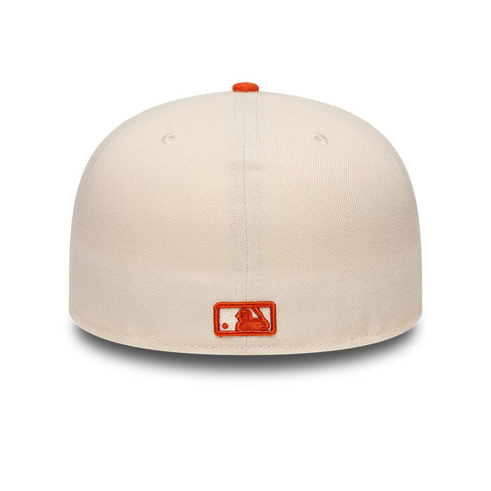 Pictured is this MLB League Essential New York Yankees 59FIFTY Fitted cap in cream. 5
