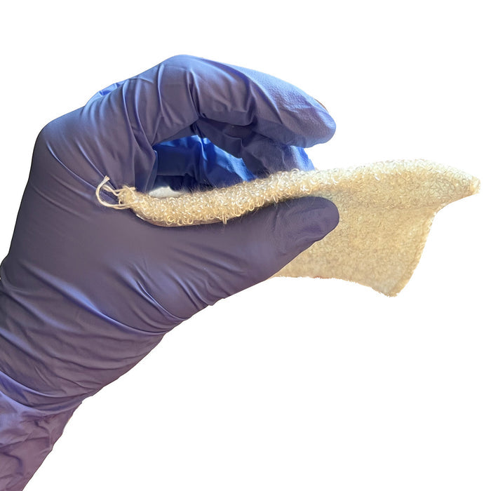 NuStat 4x4 Hemostatic Dressing in hand, flat view