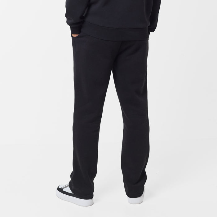 Rear view of relaxed fit tracksuit bottoms