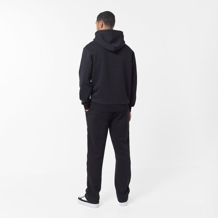 Full rear view of relaxed fit tracksuit in black