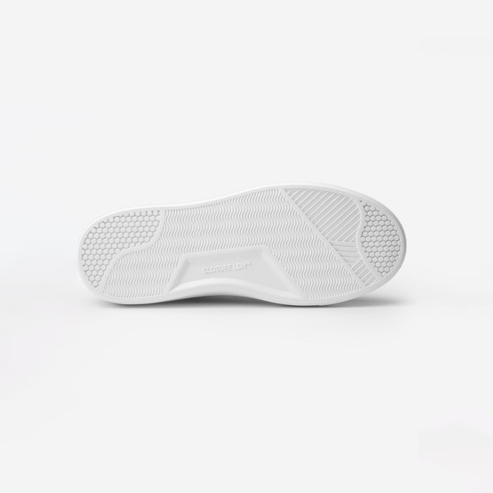 Sole view of the Premium Classic Trainer in navy, showing the textured Closure LDN custom outsole and embossed branding.