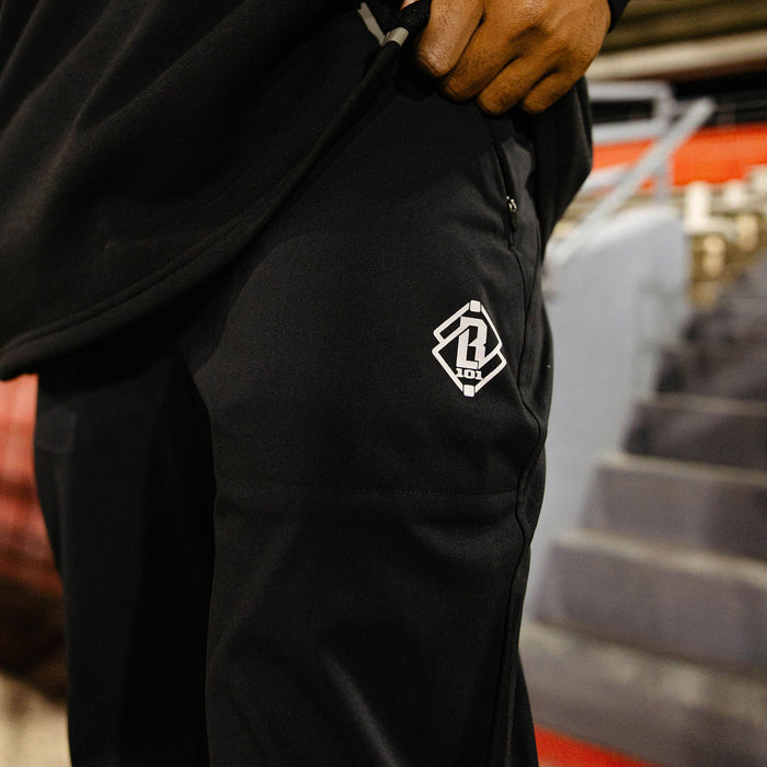Youth model wearing black Pro Series Active Pants youth pants