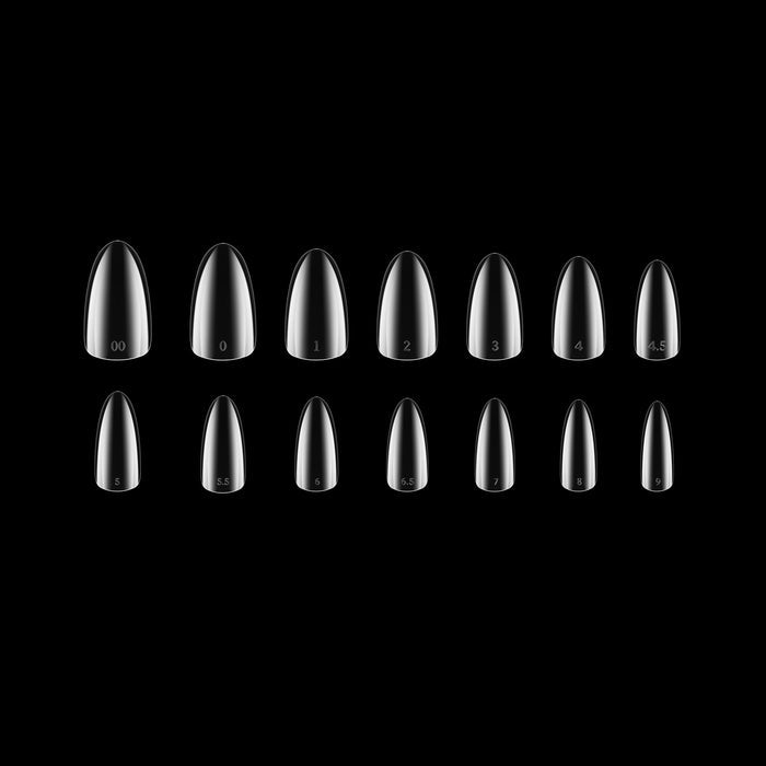 Set of black nail tips on a black background