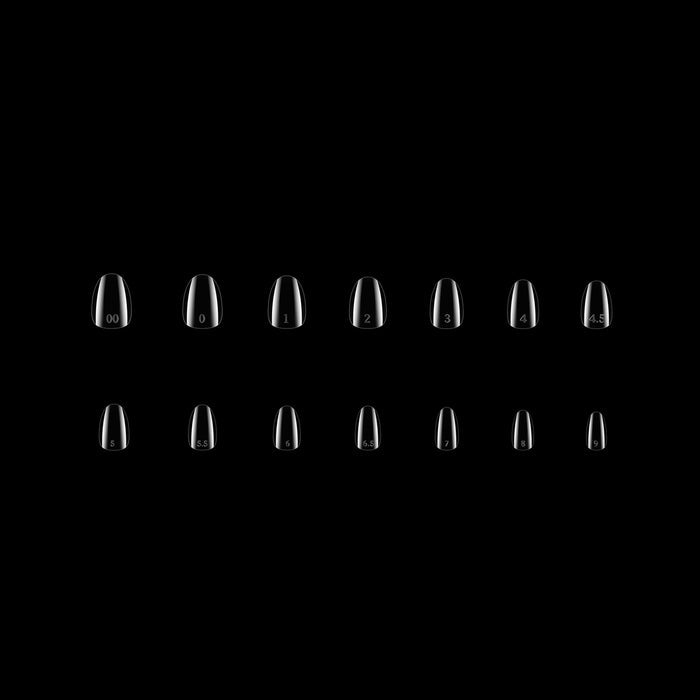 Set of clear nail tips arranged in a grid on a black background