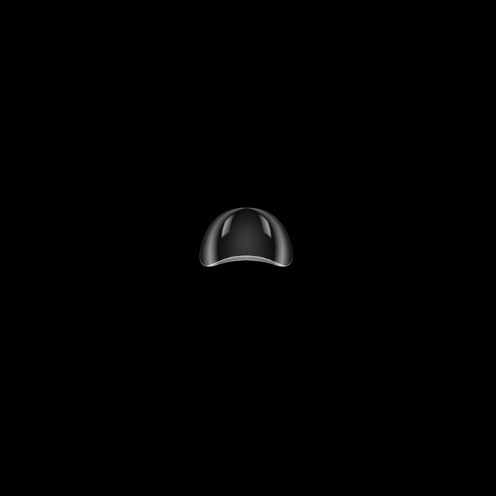 Clear nail tip on a black background